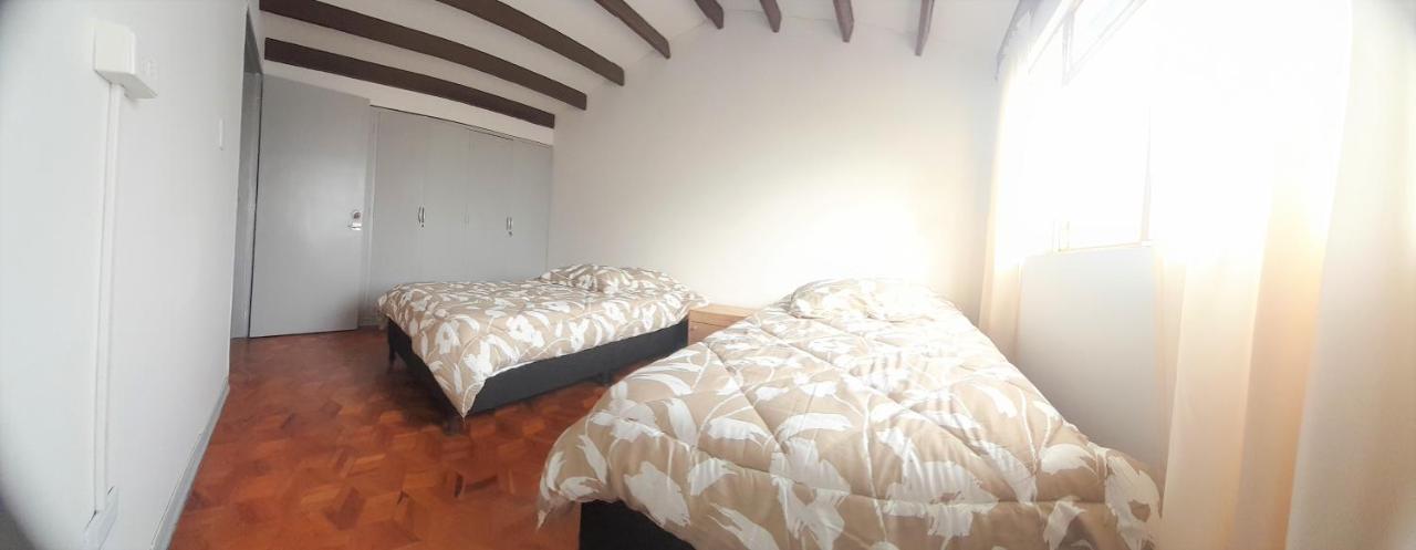 Habitación Triple Básica con baño compartido
