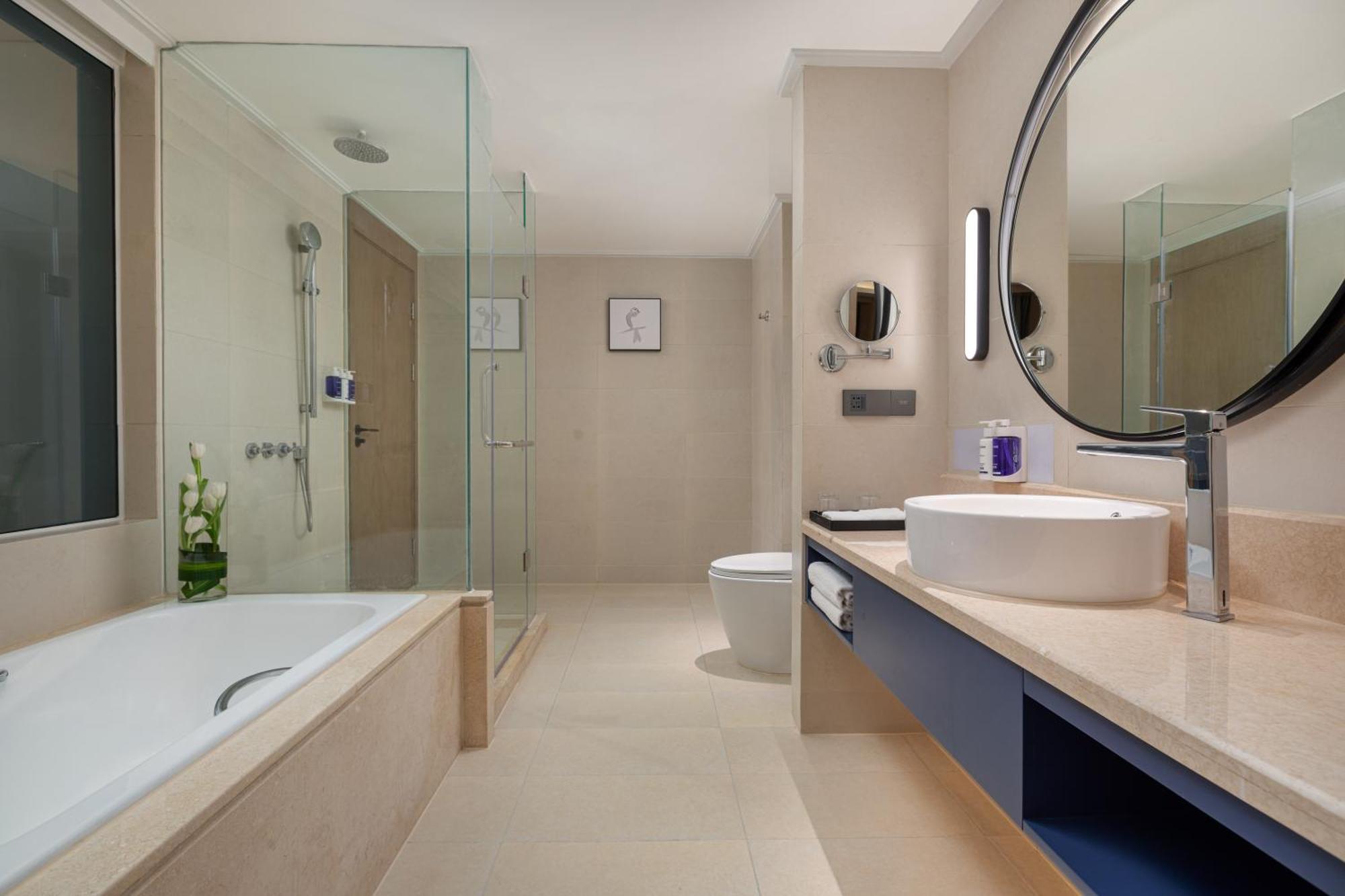 Suite met 1 Slaapkamer met Kingsize Bed en Woonruimte