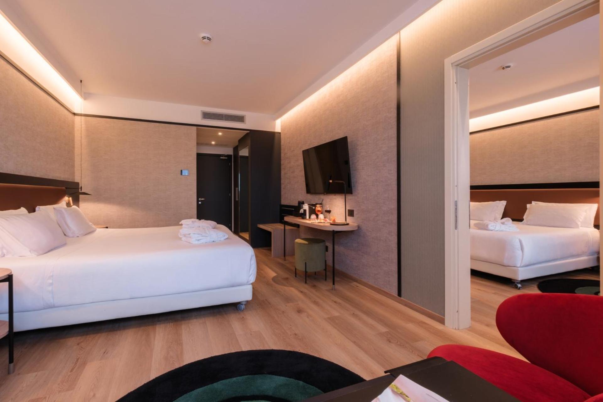 Family Connecting Room with Extra Bed (4 Adults + 1 Child)