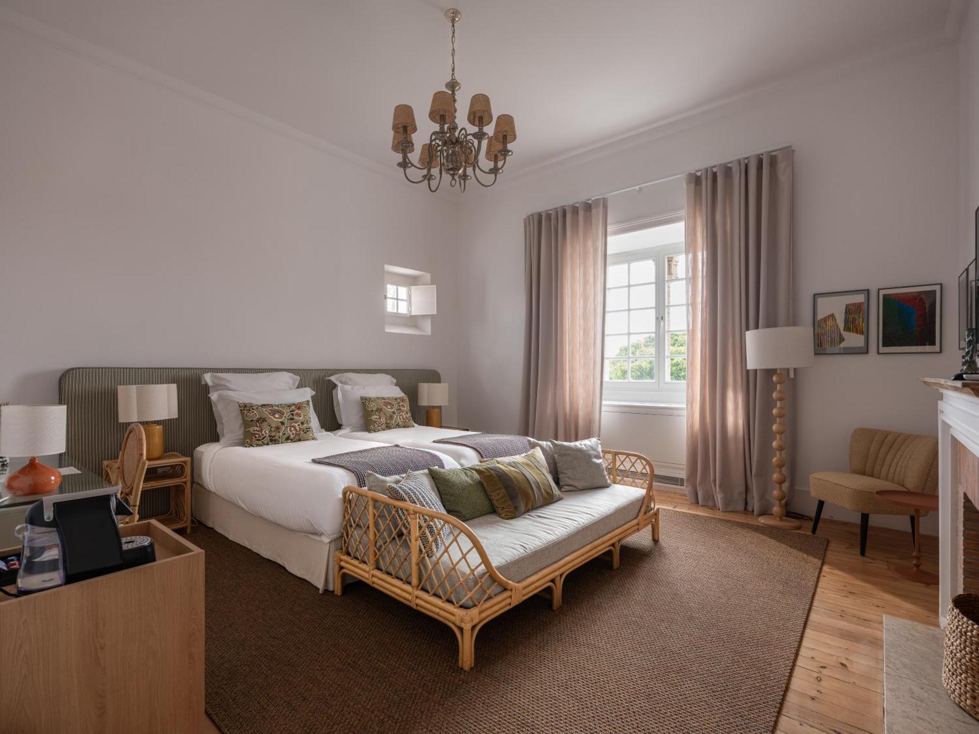 Quarto Premium com Cama de Casal ou 2 de Solteiro